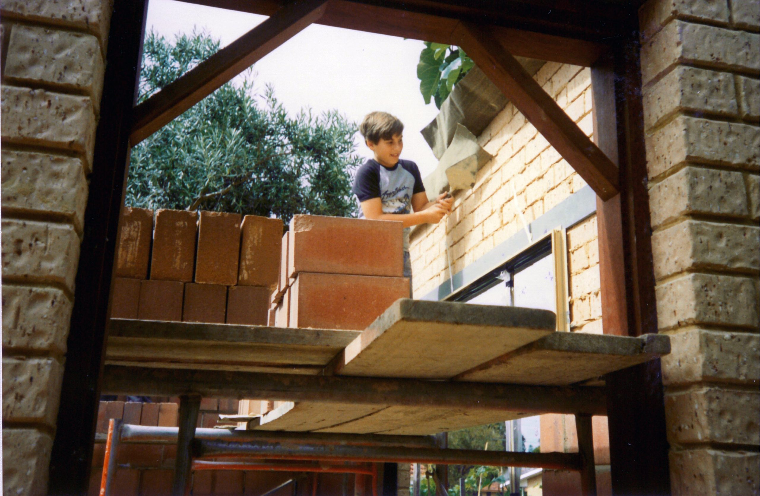 Anthony in wheelbarrow